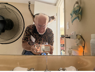 Adam with cat Pickle on my back