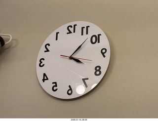 Adam nearly nude with my new bathroom mirror clock