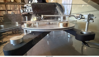 Transcriptor Skeleton turntable and Vestigal tonearm with clear vinyl record