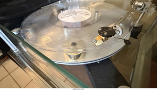 Transcriptor Skeleton turntable and Vestigal tonearm with clear vinyl record